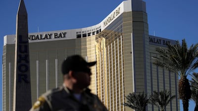 Authorities said Stephen Craig Paddock broke windows on the casino and began firing with a cache of weapons, killing dozens and injuring hundreds at the festival. John Locher/AP Photo