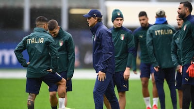 Italy manager Roberto Mancini supervises a training session at the San Siro in Milan on the eve of their Uefa Nations League match against Spain. AFP