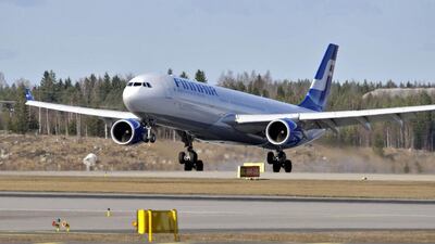A Finnair flight from New York lands at the Helsinki-Vantaa International Airport. Lehtikuva / Jussi Nukari / AFP