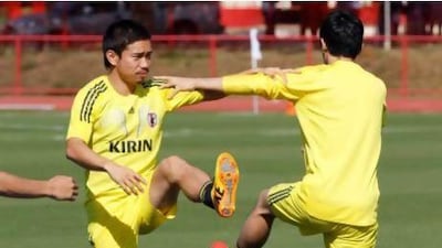 Yuto Nagatomo, left, and the Japan defence will have their hands full with Italy’s Mario Balotelli, who will be a focal point on Wednesday. Eugene Hoshiko / AP Photoiko