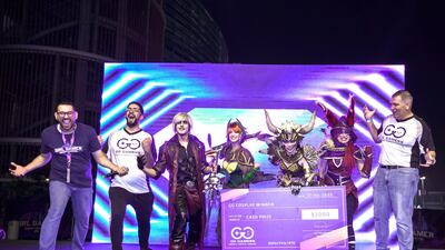 Isabel Cueva, holding the winner's cheque, beat off competition to claim the title. Victor Besa / The National