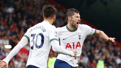 Tottenham's Ben Davies celebrates with Rodrigo Bentancur after levelling. AP