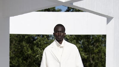 The final look of the collection is made with fabric woven with Middle Eastern geometric patterning, so dense that it almost looks like quilting. Courtesy Qasimi