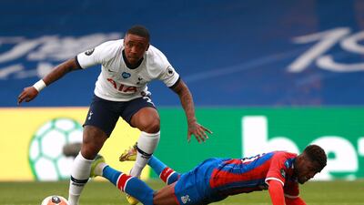 Steven Bergwijn and Wilfried Zaha in action during the Premier League match between Crystal Palace and Tottenham Hotspur. PA