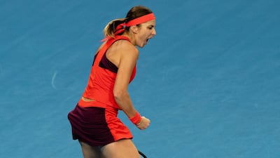 Belinda Bencic of Switzerland celebrates winning a set. EPA