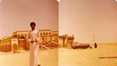 Ahmed Abdulla Al Jassasi stands before a house in Al Shahama - one of many images donated to a national project called Lest We Forget, a collection of amateur photographs taken by Emirati families. Houreya Naser Musabah Khamis Al Kalbani / courtesy Lest We Forget