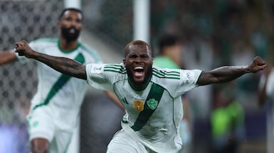 Franck Kessie of Al Ahli celebrates after teammate Feras Albrikan scores his team's goal against Machida Zelvia. Getty Images