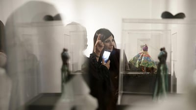 The mannequins at the show, which were more than 30cm in height, were dressed in beads, lace, ribbons, sequins, buttons and roses and later sold to the highest bidder.