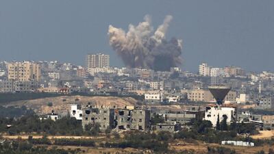 Smoke rises in the Gaza Strip after an Israeli strike August 8, 2014. Amir Cohen / Reuters