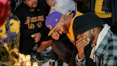 Mourners gather in Microsoft Square near the Staples Center to pay respects to Kobe Bryant after a helicopter crash killed the retired basketball star, in Los Angeles, California, U.S. REUTERS
