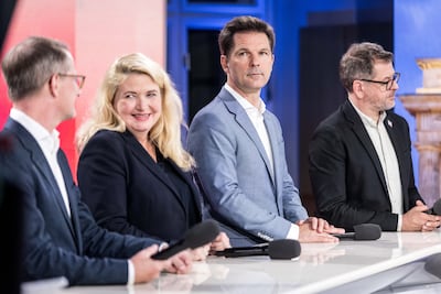 From left, Kristin Brinker, lead candidate of the far-right Alternative for Germany, Steffen Krach, lead candidate of the German Social Democrats, and Werner Graf, lead candidate of the Greens Party. Getty Images
