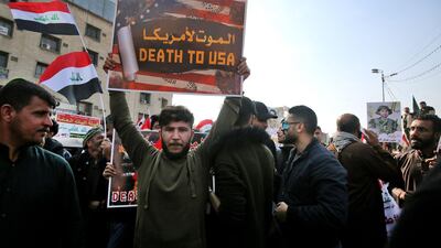 Several thousand Hashed supporters marched into Tahrir Square brandishing sticks, Iraqi flags and the Hashed's logo, a symbol shunned by the vast majority of protesters.