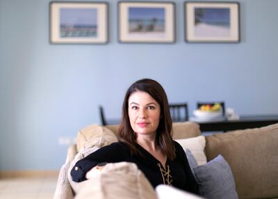 Ms Osman's financial goal is to buy a home in her native UK. Reem Mohammed/The National