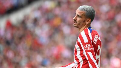 Antoine Griezmann has re-signed with Atletico Madrid from Barcelona on a permanent deal until 2026. AFP