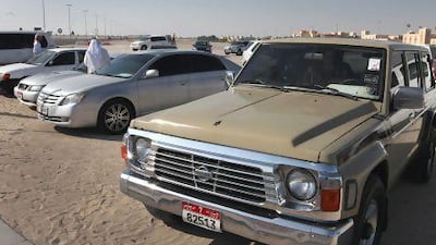 Al Shamkha roundabout turns into a used car sales lot during the weekends where sellers and buyers merge. Delores Johnson / The National