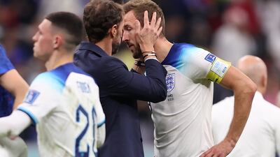 Harry Kane of England is consoled by manager Gareth Southgate after their 2-1 defeat to France. Getty