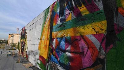 View of part of Brazilian artist Eduardo Kobra’s huge mural representing the five continents, at the Olympic Boulevard, in Rio de Janeiro, Brazil. Christophe Simon / AFP