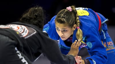 Beatriz Mesquita of Brazil, right, fights Jessica Arlindo Dos Santos of Brazil during their brown black adult 65kg final match at the Abu Dhabi World professional jiu-jitsu championship at IPIC Arena in Abu Dhabi on April 23, 2015. Christopher Pike / The National