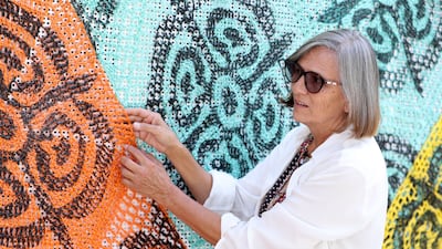 Lorena Ron says the crocheted hanging represents 100 mothers of Mexico hugging the country they love.
