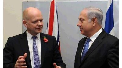 In this photograph released by the Israeli Government Post Office, William Hague, left, the British foreign minister, meets Benjamin Netanyahu, the Israeli prime minister, in Tel Aviv yesterday. Moshe Milner / AFP / Handout