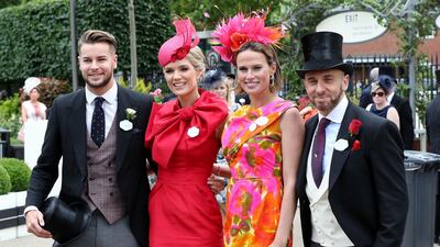 Racegoers during ladies day. PA