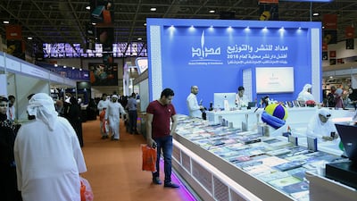 Visitors take a look at the books during the Sharjah International Book Fair at the Sharjah Expo Centre in Sharjah. Satish Kumar for the National