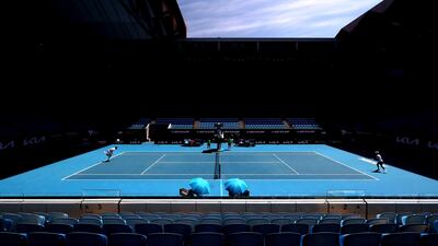 Daniil Medvedev of Russia and Mackenzie McDonald of the US on court at the Australian Open tennis championship at Melbourne Park, Melbourne, Victoria. Medvedev won the match in three sets. Reuters