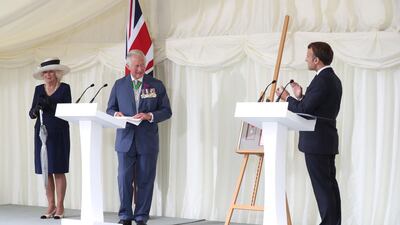 French president Emmanuel Macron, Britain's Prince Charles and Britain's Camilla, Duchess of Cornwall attend a ceremony at the statue of former French president Charles de Gaulle at Carlton Gardens. AFP