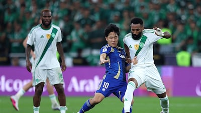 Firas Al Buraikan of Al Ahli is challenged by Na Sang-ho of Machida Zelvia. Getty Images