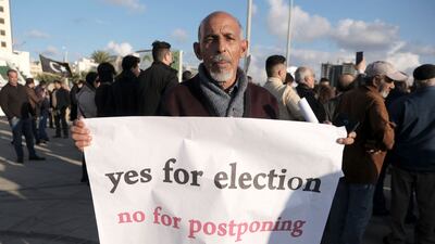 A man protests against the postponement of the Libyan presidential election, in Benghazi, Libya. Reuters