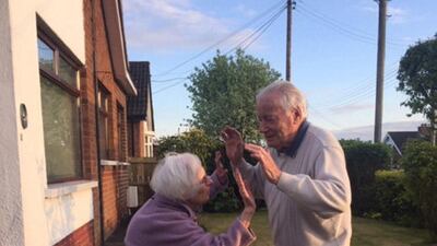 Gladys and Jack join the weekly applause for the National Health Service. Tricia Gilmore/NPG