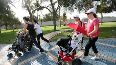 Sarah Moore, Maya Masri, Jo Hawi and Hilary O'Hagan participate in the Mummies with Buggies exercise class on the Corniche.