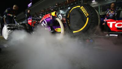 Daniel Ricciardo of Red Bull Racing’s team prepare his car on the grid. Mark Thompson / Getty Images