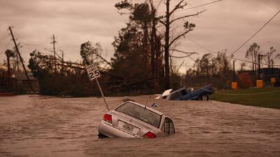 Vehicles sit partially submerged in floodwaters after Hurricane Michael hit in Panama City, Florida. Bloomberg