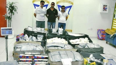 Police apprehend three men in Dubai with more than 4.6 million pills of the amphetamine fenethylline, also known as Captagon, which has a street value of Dh115 million. Courtesy Dubai Police