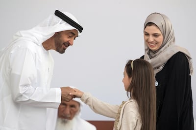 Sheikh Mohammed bin Zayed, Crown Prince of Abu Dhabi and Deputy Supreme Commander of the Armed Forces, presents an Abu Dhabi Award to Layan Al Zoebie and Dr Lama Al Zoebie, who are receiving the award on behalf of their late father, Dr Azzam Al Zoebie. Ryan Carter for the Crown Prince Court - Abu Dhabi