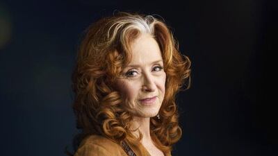 Blues singer and guitarist Bonnie Raitt won her 10th Grammy for the album Slipstream in 2013. Drew Gurian / Invision / AP Photo