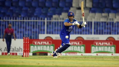Darwish Rasooli of Afghanistan plays a shot during the Tri-series match against UAE at Sharjah Cricket Stadium.