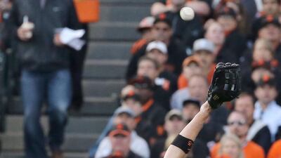 San Francisco Giants Travis Ishikawa can’t catch an RBI double by St. Louis Cardinals’ Jon Jay in the third inning during Game 5 of baseball’s NL Championship Series, Thursday, Oct. 16, 2014, in San Francisco. The Giants won 6-3, and advanced to the World Series. AP Photo/St. Louis Post-Dispatch, J.B. Forbes