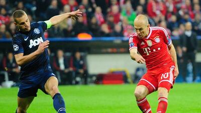 Arjen Robben of Bayern Munich scores his teams third goal during the Champions League match against Manchester United. Lennart Preiss / Bongarts / Getty Images / April 9, 2014