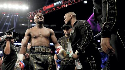 Floyd Mayweather in the ring for his super welterweight boxing match against Conor McGregor on August 26, which made him the year's highest paid sportsman in 2017. Christian Petersen/Getty Images