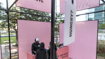 Customers place their orders in the DIFC pop up. Antonie Robertson / The National