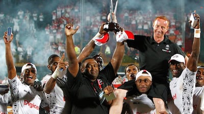 Ben Ryan (black shirt, right) coached Fiji to two Dubai Rugby Sevens titles as well as Olympic Gold at the 2016 Games in Rio. Jake Badger for The National