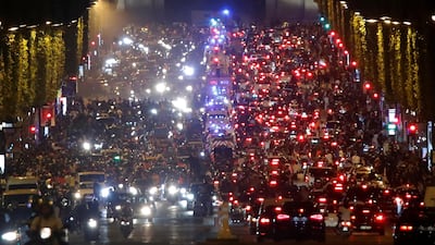 Fans fill the Champs Elysees. Reuters