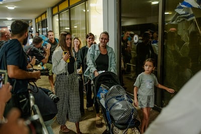 Passengers walk out of the terminal at Ben Gurion Airport on September 30 after being retrieved by a second flydubai plane. Photo: Getty Images
