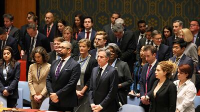 Members of the Security Council rise for a moment of silence during a meeting on the war in Ukraine at UN headquarters. AFP