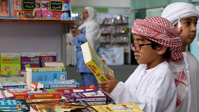 Visitors at the Al Ain Book Fair 2016 at the Convention Centre in Al Ain. Satish Kumar / The National