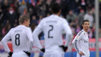 Cristiano Ronaldo looks on after Atletico Madrid score their third goal in the 4-0 victory over Real Madrid on February 7. Dennis Doyle / Getty