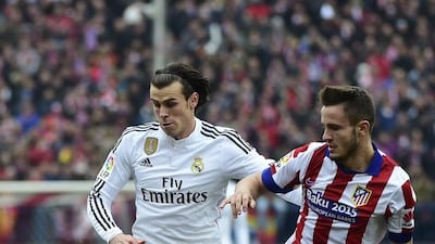 Real Madrid’s Gareth Bale, left, is back from an injury and will try to end his club’s six-match winless streak against Atletico Madrid on Tuesday night. Pierre-Philippe Marcou / AFP
