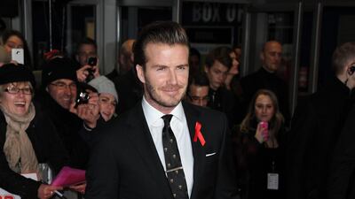 David Beckham, in a dapper suit and tiebar, attends the premiere of 'The Class of 92' at Odeon West End on December 1, 2013 in London, England. Getty Images